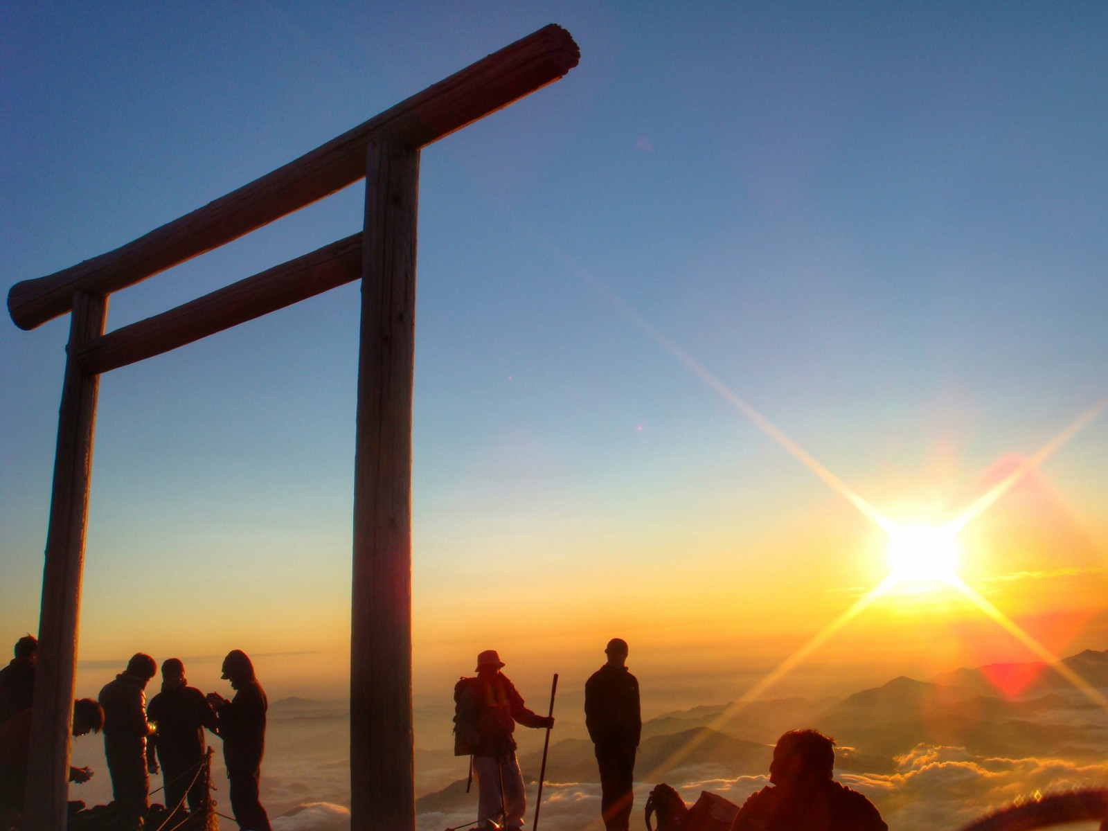 Watching the sunrise at the summit of Mt Fuji